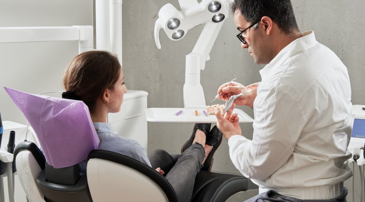 dentist explaining treatment to patient