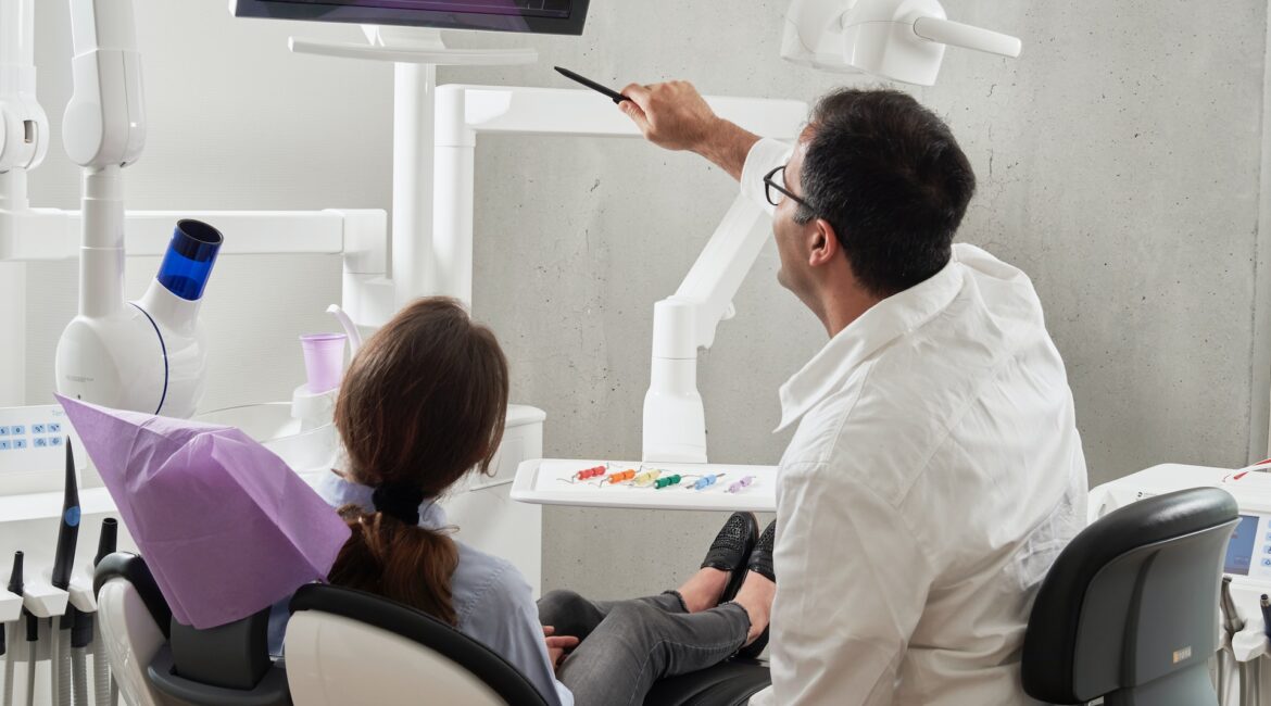 dentist discussing teeth xray to patient