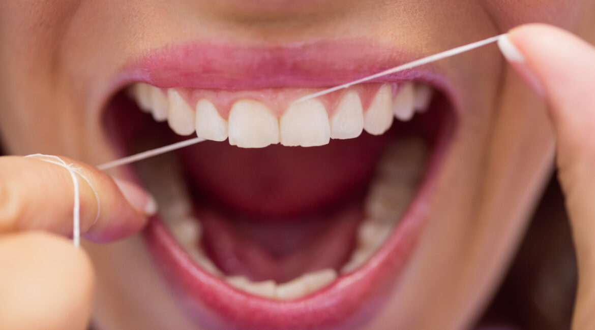 woman flossing